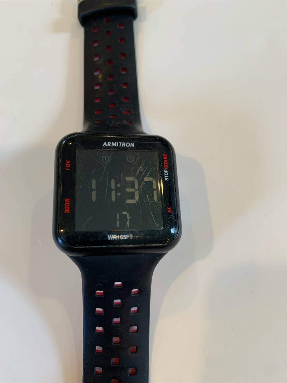 Armitron Men’s Black and Red Sport Digital Watch with Stop Watch Perforated Band